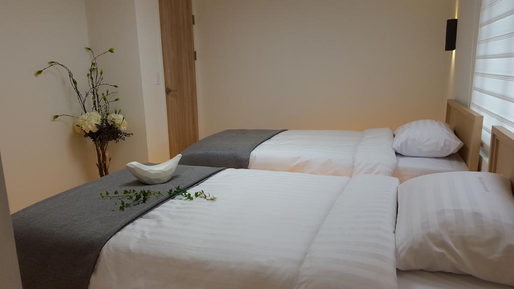 Woo Guest House Seúl Habitación foto